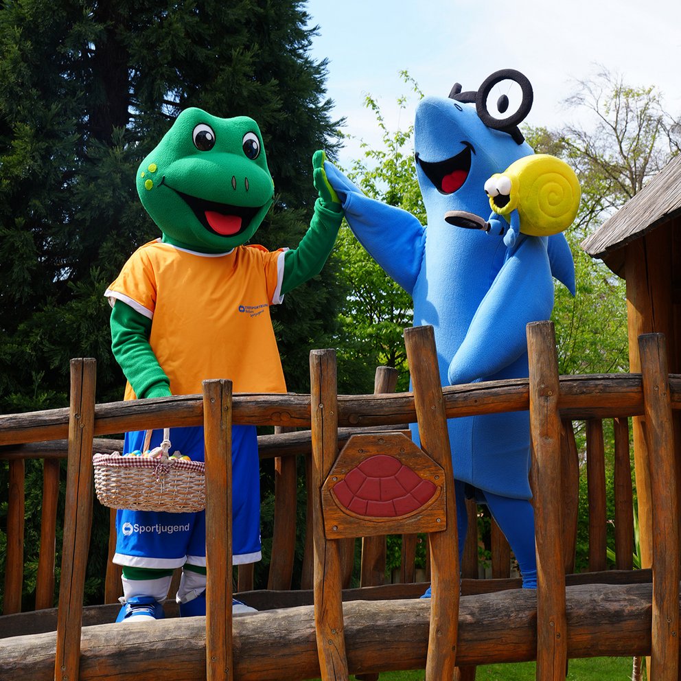 Die Maskottchen Froggy und Haini + Fossi